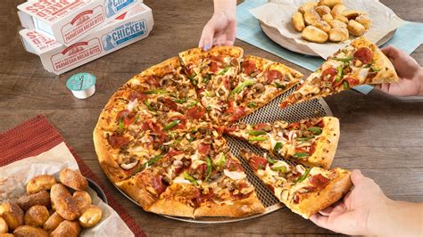 dominos pizza makassar menyajikan Saldo akun dan topup emas engagement tinggi info image 1
